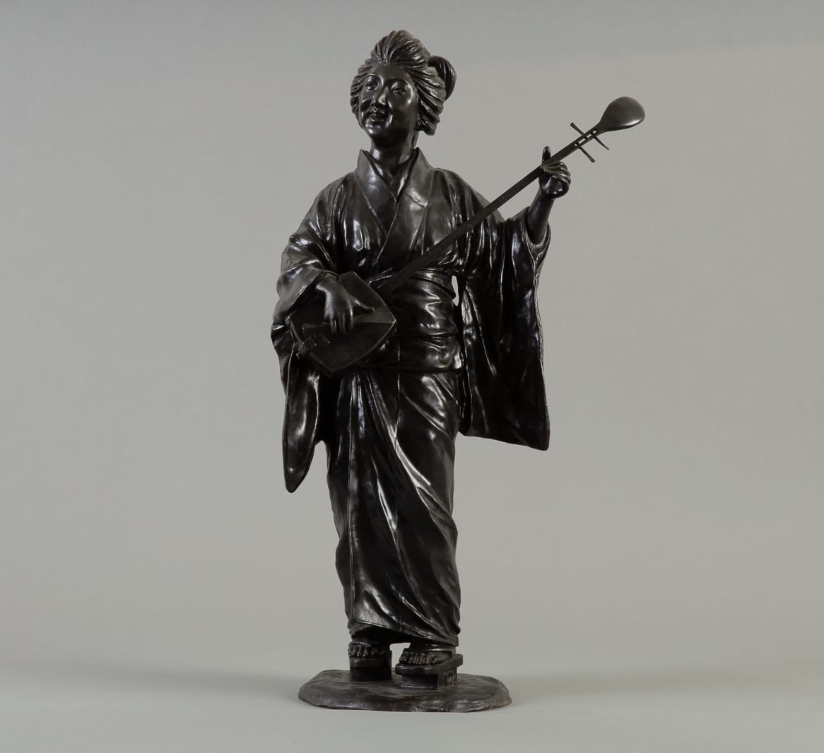 Lot 010: Japanese Meiji Bronze Geisha Okimono Signed
