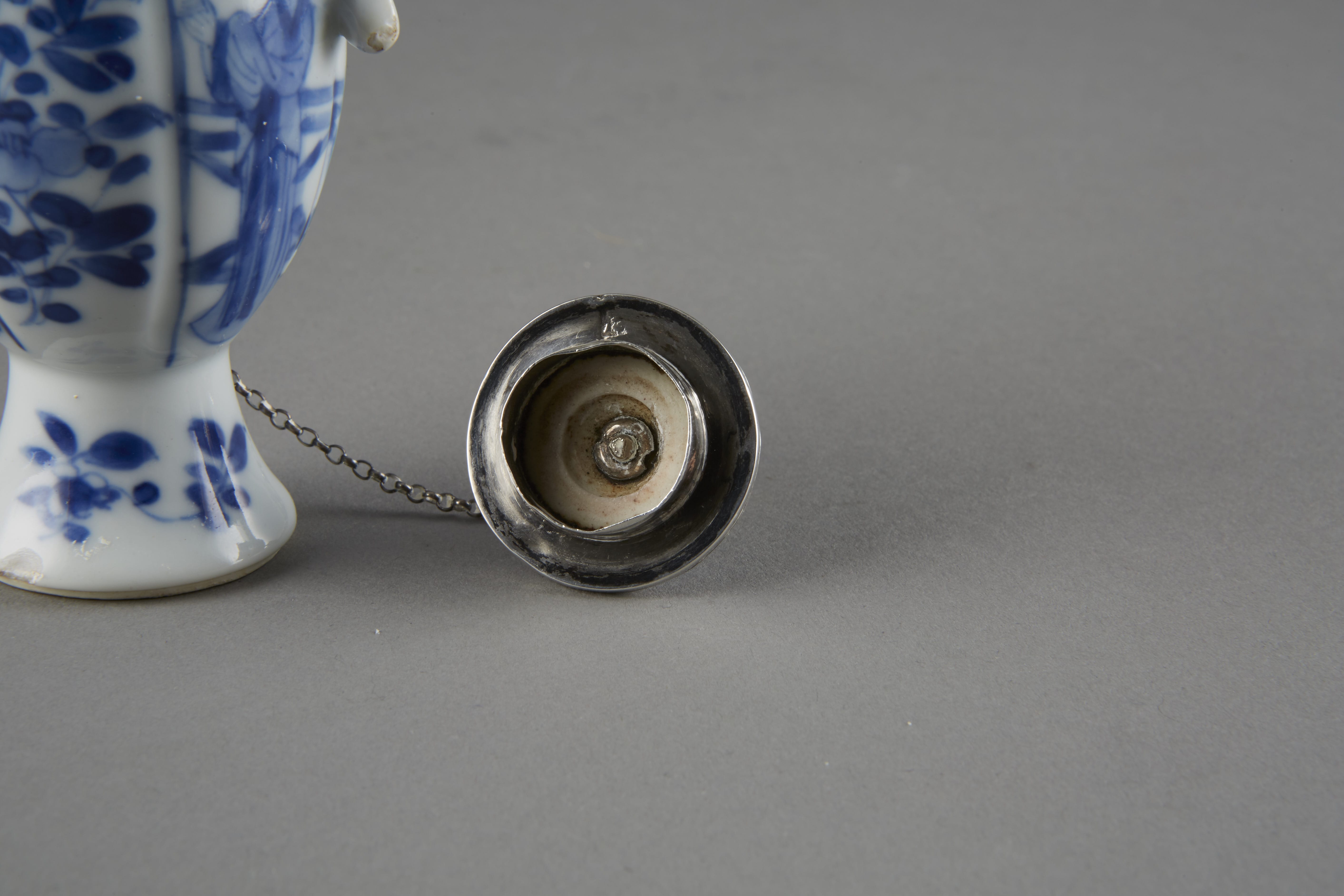 Lot 087: Chinese 18th Century Kangxi Blue and White Export Porcelain Silver Mounted Wine Ewer