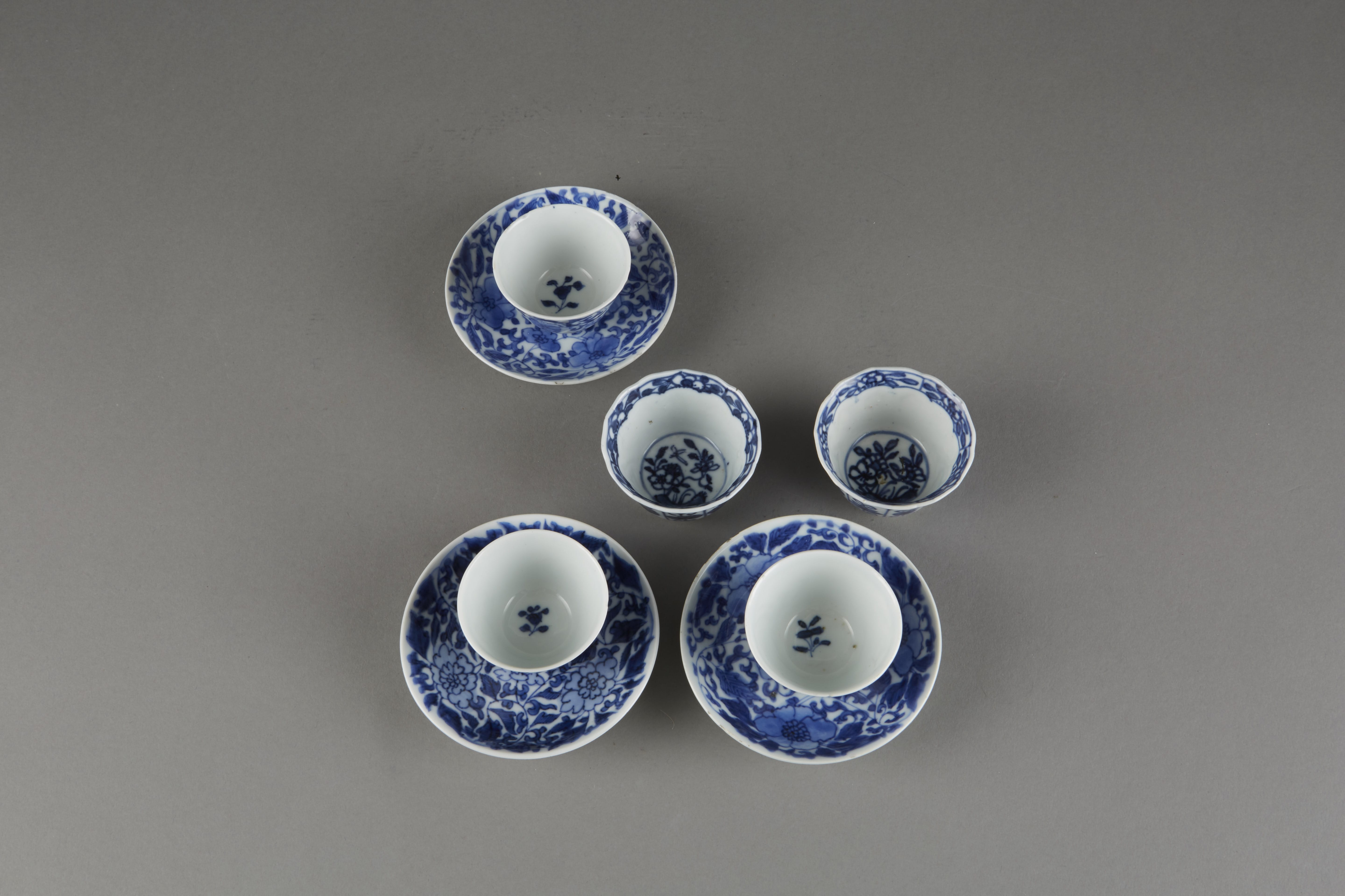 Lot 089: Chinese 18th Century Kangxi Blue and White Export Porcelain Set of Three Cups and Saucers and Two Cups
