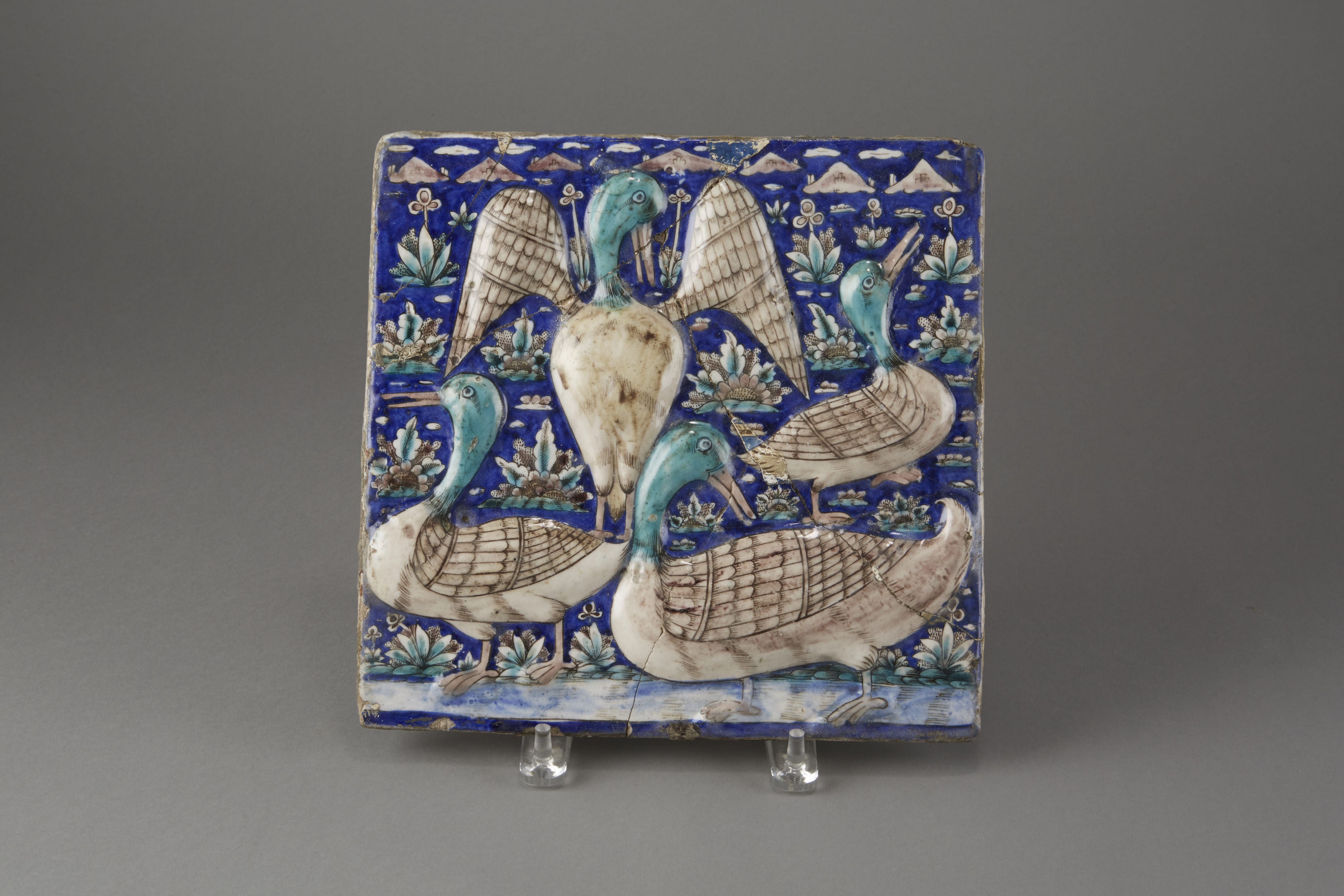 Lot 160: 19th Century Persian Qatar Moulded Tile of Ducks