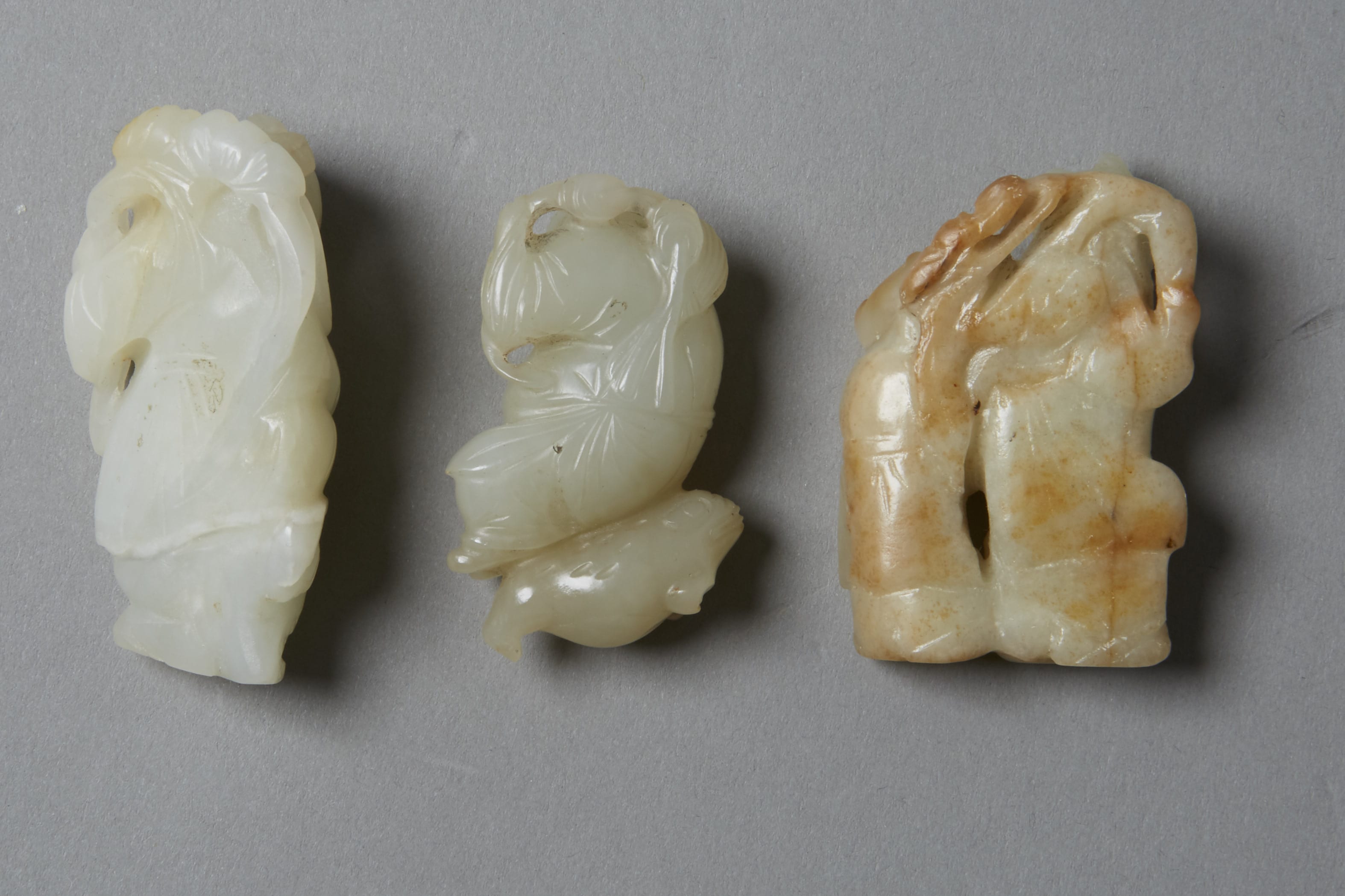 Lot 016: Group of 3:  19th century Chinese Jade Carved Figures