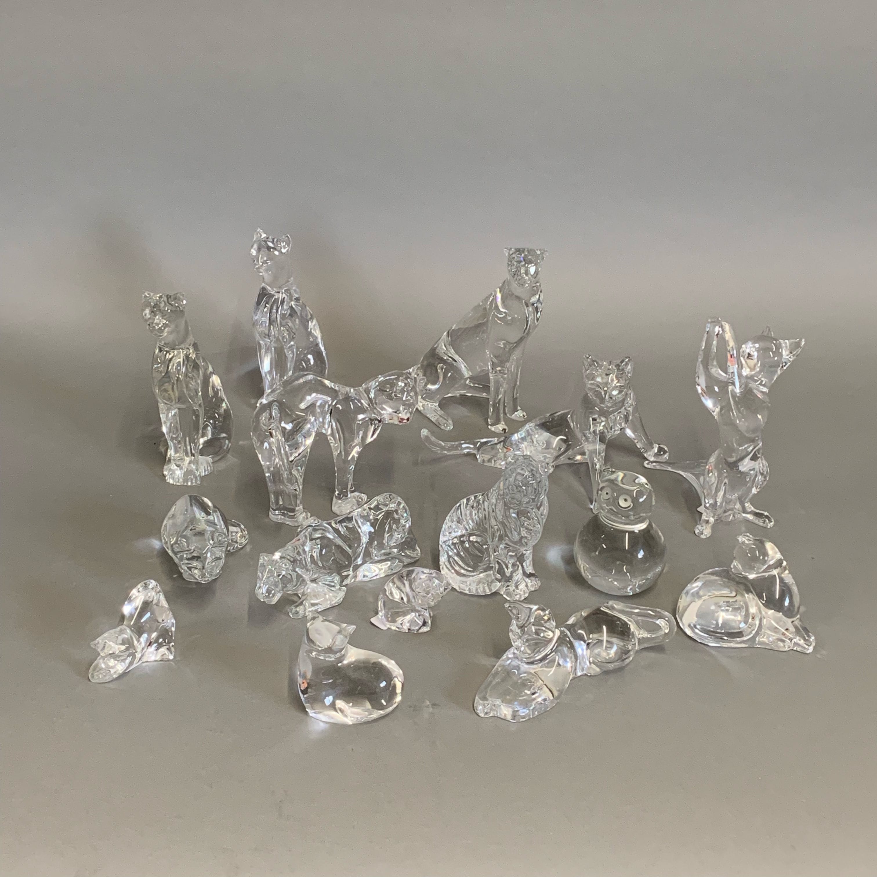 Lot 125: Group of 15 Baccarat Crystal Cat Figurines
