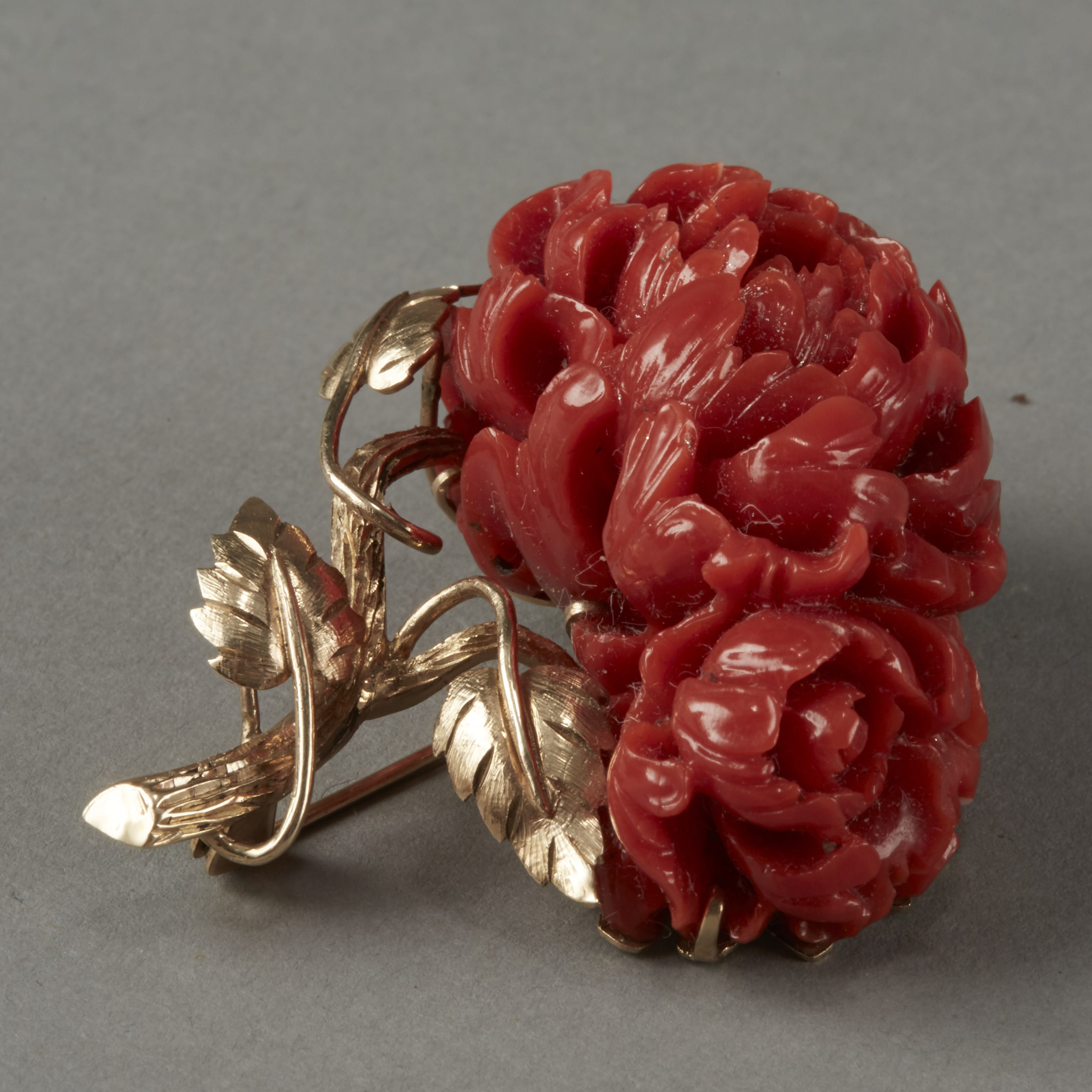 Lot 205: Gold and Deep Red Coral Pin or Brooch in the form of a Chrysanthemum