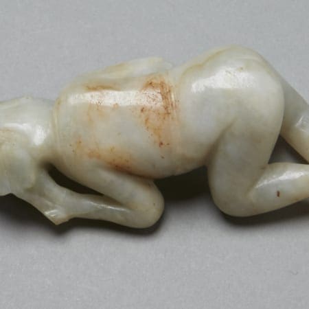 Lot 028: Chinese early 19th century blue/grey Jade Reclining Maiden