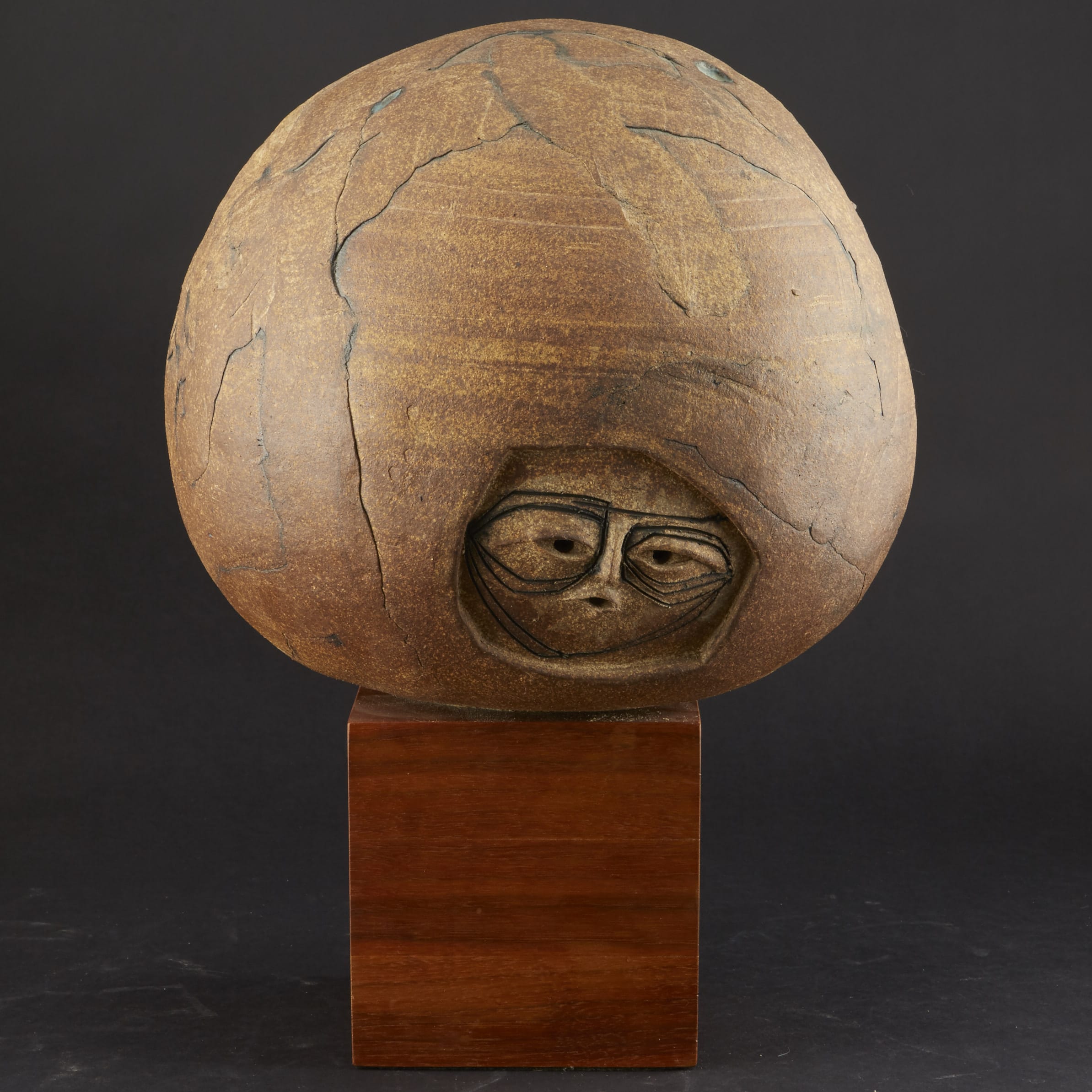 Lot 147: Joel Edwards Globe with Faces