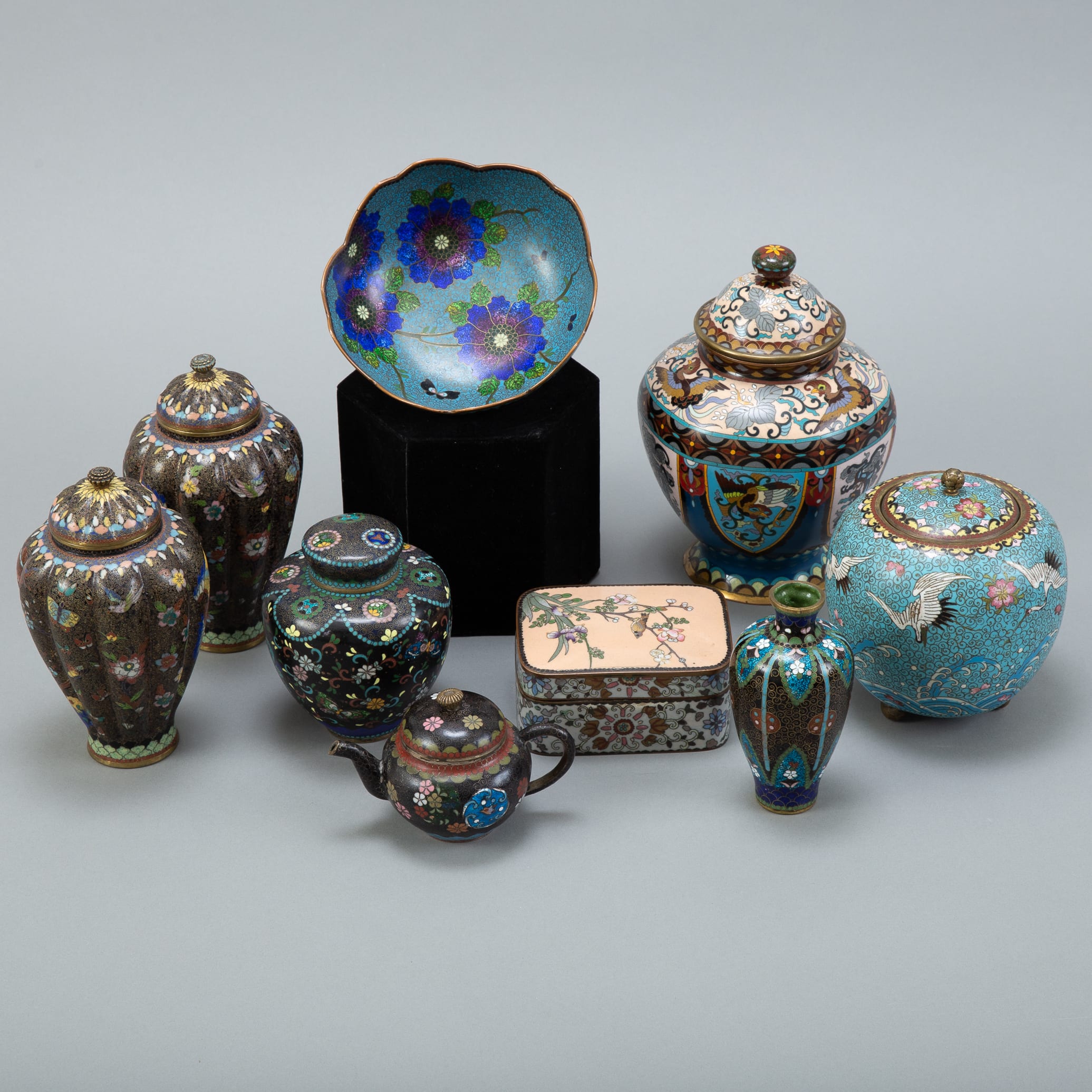 Lot 025: Grp: 9 Japanese Meiji Cloisonne vases boxes
