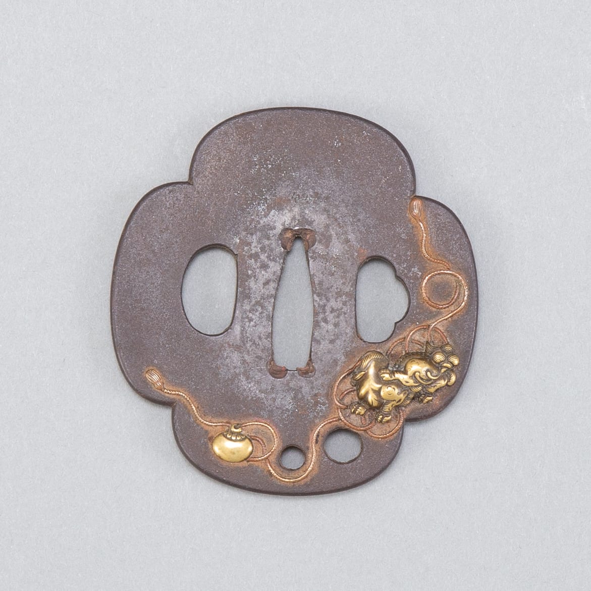 Lot 035: Japanese Edo Period Iron Tsuba with Shishi Dog