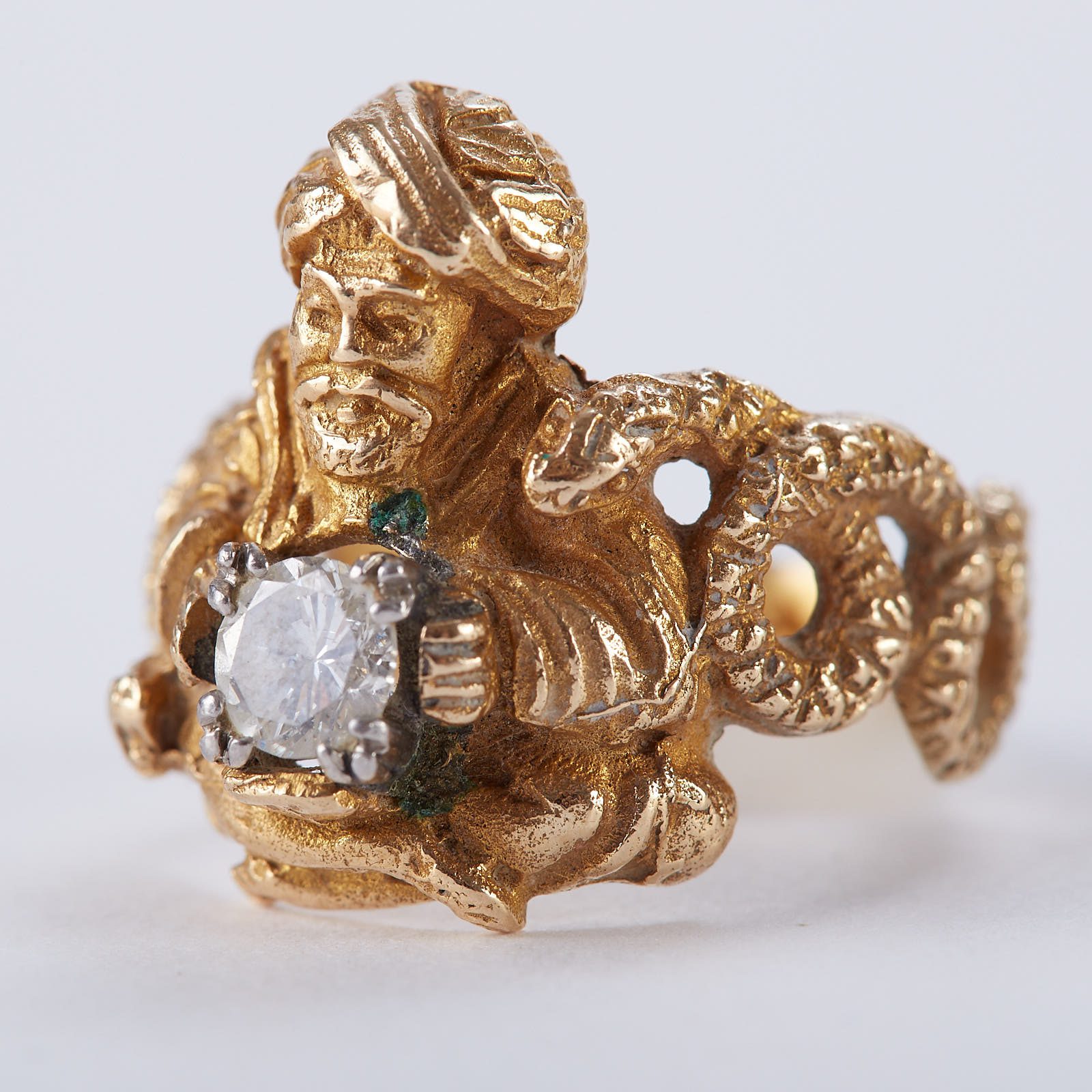 Lot 187: Diamond Ring with Man and Snake