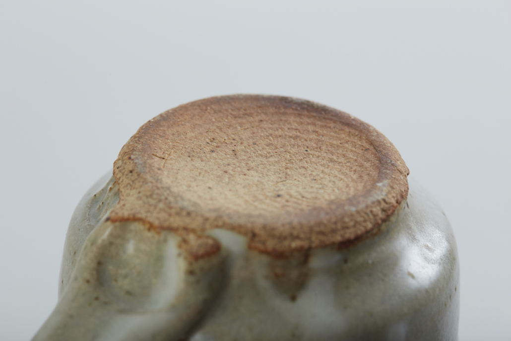 Warren MacKenzie Pottery Mug Warren MacKenzie pottery mug, showing rings from wheel-throwing.