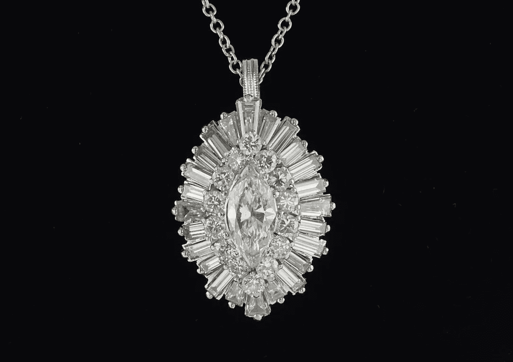 Marquise-cut diamond ballerina pendant necklace in white gold; request a jewelry appraisal