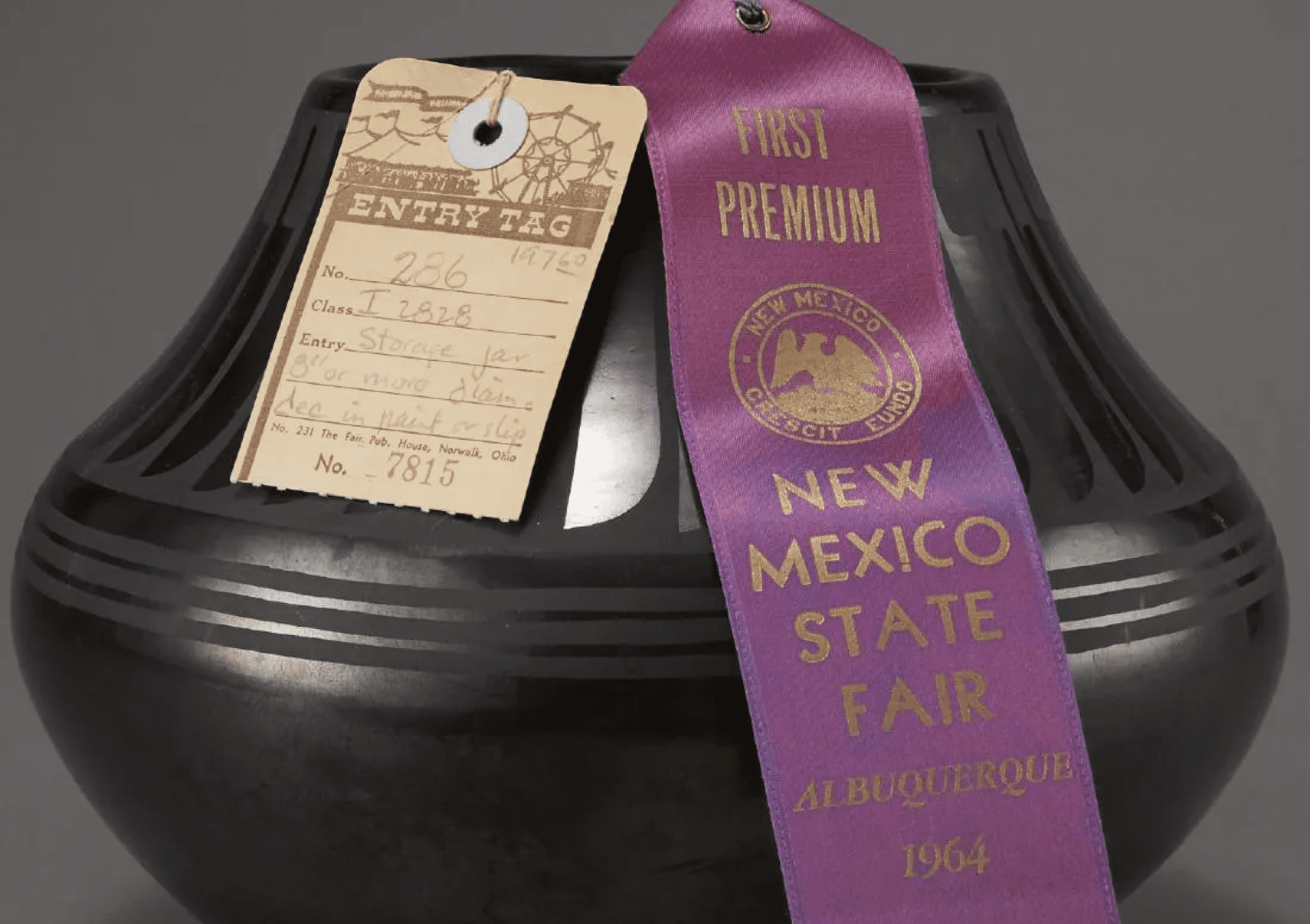 Maria Martinez blackware pottery jar with a 1964 New Mexico State Fair ribbon