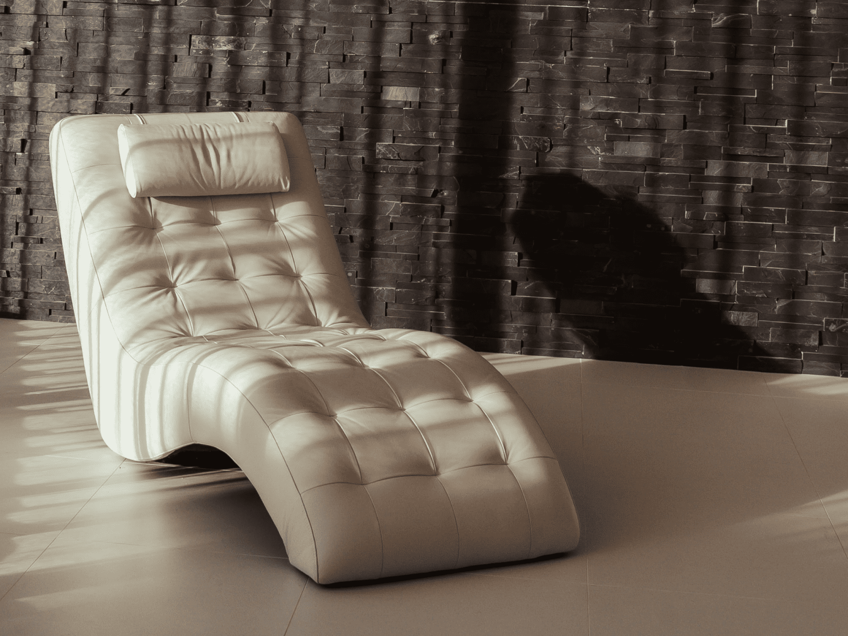 Midcentury cream tufted chaise lounge