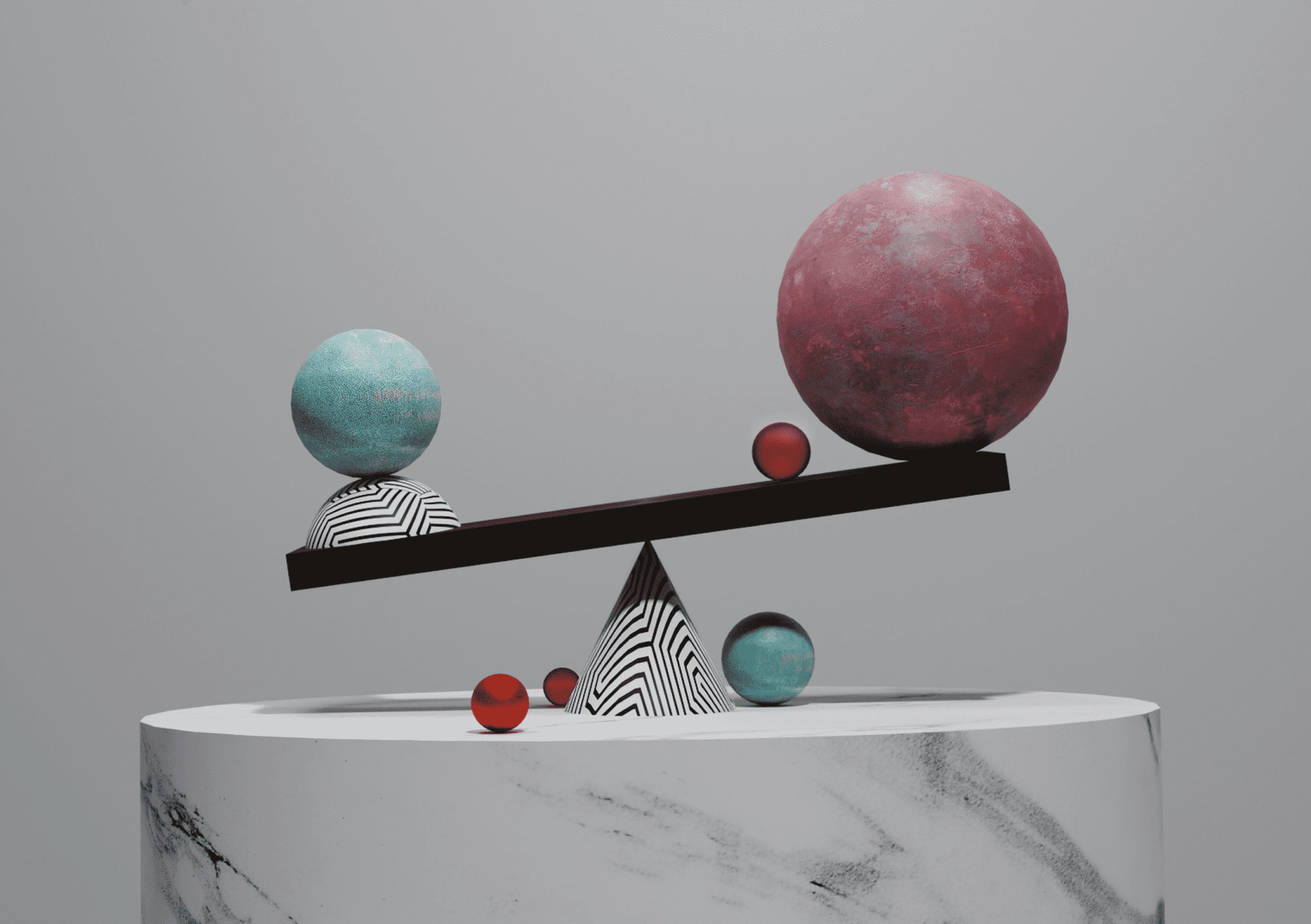 Two spheres balanced on a seesaw over a marble pedestal
