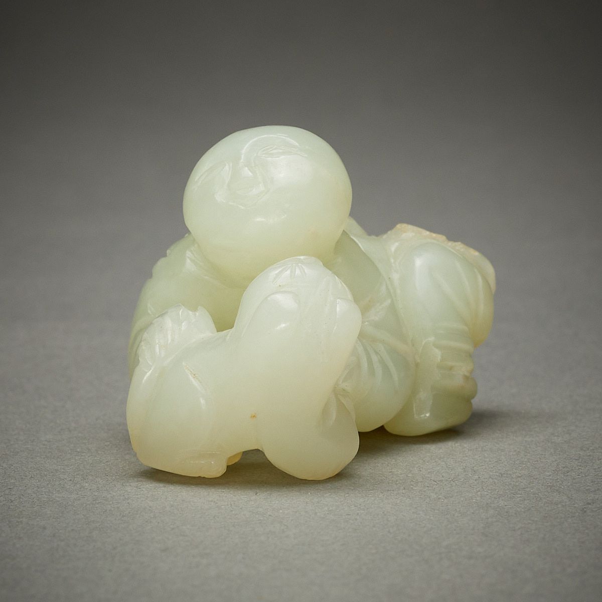 le_pho_banner 2 18th-19th c. Chinese Pale Jade Boy w/ Dog Carving