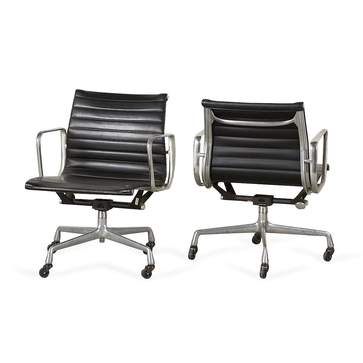 le_pho_banner 2 Pair of Aluminum Group Eames Chairs