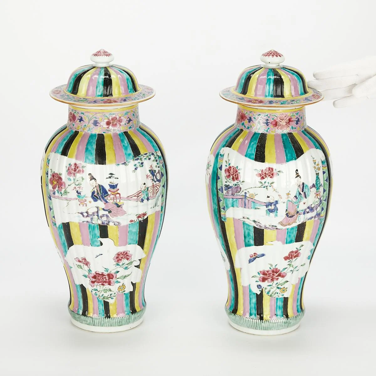 chinese-export-porcelain-vases Pair of baluster-shaped Chinese export porcelain vases with colorful vertical stripes and figurative scenes.