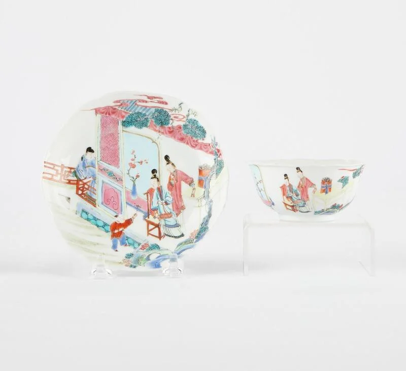 chinese-famille-rose-lobed-teabowl-saucer Chinese Famille Rose lobed porcelain teabowl and matching saucer painted with classic courtly figures.