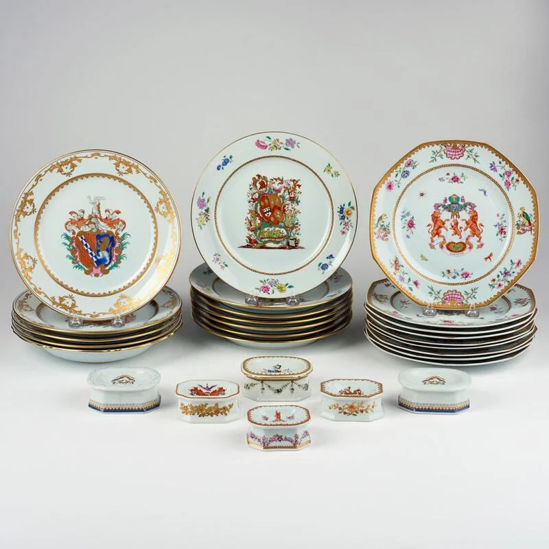 mottahedeh-rockefeller-armorial-plates-salts Mottahedeh Rockefeller style porcelain service set featuring armorial plates and small salt cellars.