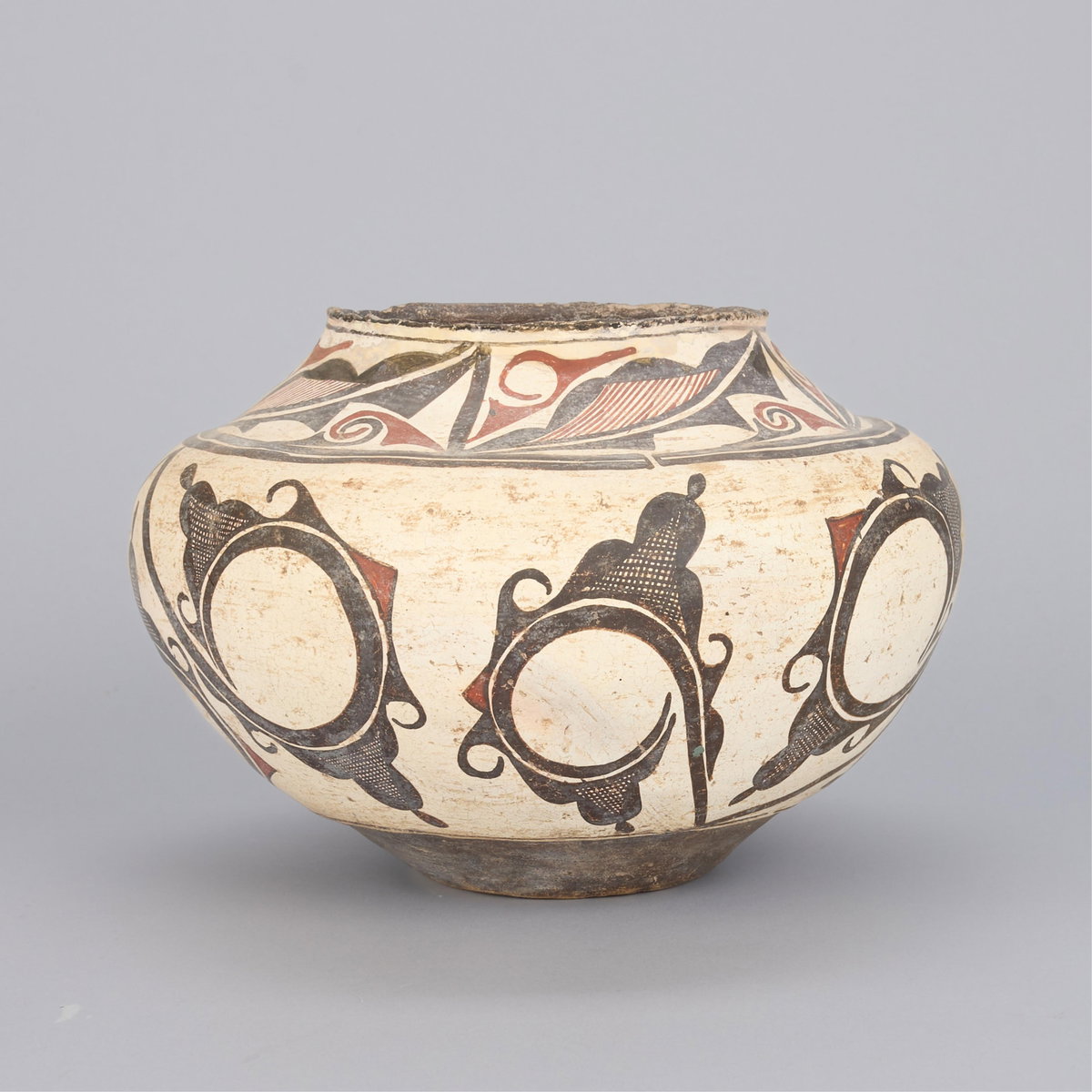 19th century Zuni polychrome rainbird olla jar sold by Revere Auctions