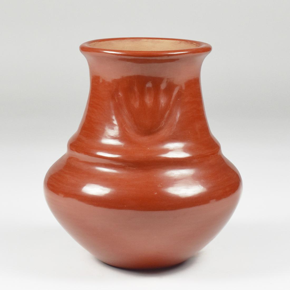 Margaret Tafoya Santa Clara carved redware jar sold by Revere Auctions